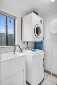 Una cocina o cocineta en Aquarius Merimbula
