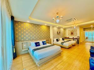 Katil atau katil-katil dalam bilik di บรรเจิด วิลล่า บีช@สิชล