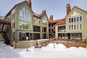 a large house with snow in front of it at Etta Place 1 by AvantStay Ski In Ski Out Unit w Views of the Slopes in Telluride