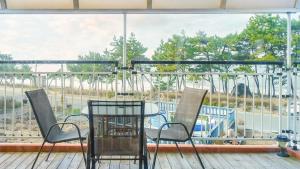 Balkón nebo terasa v ubytování Boeryeong Rainbow Oceanview Pension
