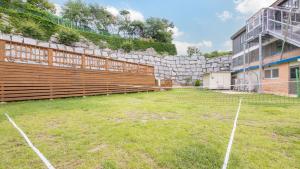 Zahrada ubytování Ganghwa Paeng namu Pension + 3 fotografie