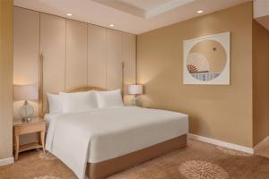 Dusit Princess Melaka客房内的一张或多张床位