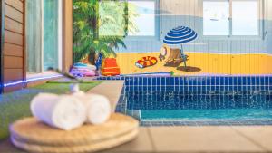 a toy swimming pool with a toy house with a swimming pool at Cheongdo Ellago Poolvilla Pension in Cheongdo +3 photos
