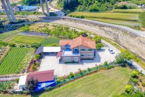an aerial view of a house with a yard at Samcheok Greenhyang Pension in Samcheok