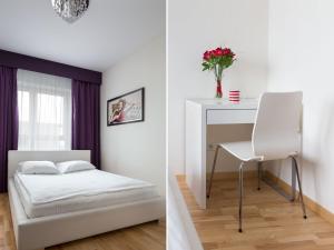 ワルシャワにあるChopin Apartments - Platinum Towersのベッドと机のある白い寝室 +35枚の写真
