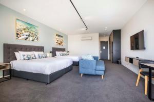 Rye Hotel by Nightcap Plus客房内的一张或多张床位
