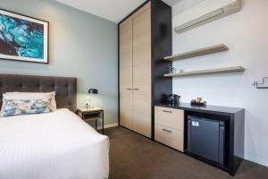 Rye Hotel by Nightcap Plus客房内的一张或多张床位