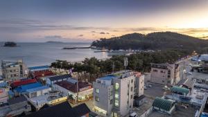 an aerial view of a city with the water at Taean yeonpo 2020 pension in Taean