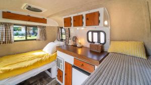 Voodi või voodid majutusasutuse Geumsan Lalaland Caravan toas