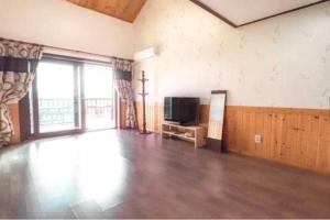 TV a/nebo společenská místnost v ubytování Ganghwa nolumog byeoljang + 9 fotografií