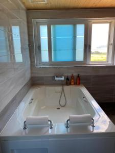 Koupelna v ubytování Ganghwa nolumog byeoljang