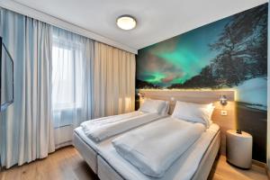 Voodi või voodid majutusasutuse Thon Hotel Polar toas +17 fotot
