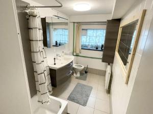 Ένα μπάνιο στο Nice Apartment in Mörfelden