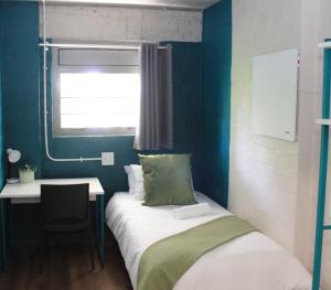 Ένα ή περισσότερα κρεβάτια σε δωμάτιο στο Stay at Cape Station