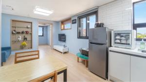 Kuchyň nebo kuchyňský kout v ubytování Jeju Hue Pension + 15 fotografií