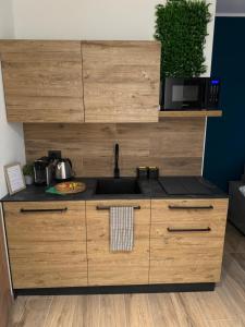 a kitchen with a sink and a counter top at TIME To ESCAPE 3 in Tirano