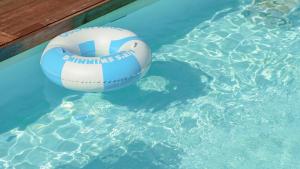 a blue and white volleyball in a swimming pool at Hongcheon inmylife dokche pension in Hongcheon