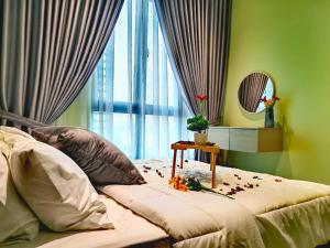 Giường trong phòng chung tại Meta City Equine Park IOI City Mall Serdang UPM +31 ảnh