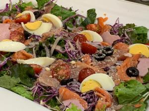 a salad with eggs and other vegetables on a plate at ANA Holiday Inn Sapporo Susukino by IHG in Sapporo
