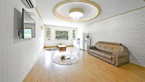Χώρος καθιστικού στο Tongyoung Macaio Pension