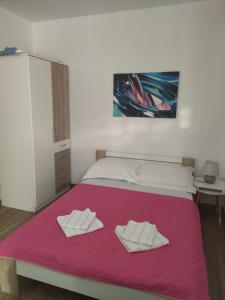 Voodi või voodid majutusasutuse Bol Studio Center toas