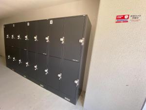 a row of lockers in a locker room at The Peak Tengachaya in Osaka