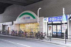 a group of bikes parked in front of a store at The Peak Tengachaya in Osaka