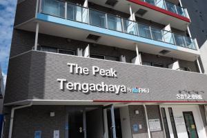 a building with a sign that reads the peak tengazbeyagency at The Peak Tengachaya in Osaka