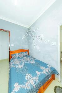Postel nebo postele na pokoji v ubytování Reverie Hotel