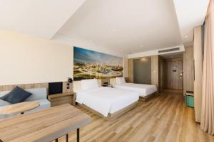 Voodi või voodid majutusasutuse Atour Hotel Chongqing Jiefangbei toas