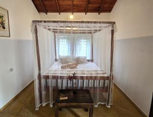 Letto o letti in una camera di Ginger Harmony Guesthouse and Cafe