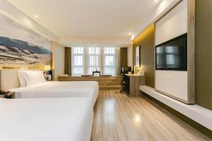 Postel nebo postele na pokoji v ubytování Atour Hotel Chengdu Shuangliu International Airport