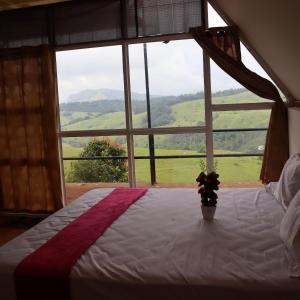 Postel nebo postele na pokoji v ubytování Chill mount vagamon + 9 fotografií