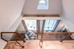 Ένα ή περισσότερα κρεβάτια σε δωμάτιο στο Juliane - Galeriesuite