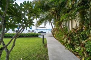 A garden outside Bright beachfront retreat in Bang Tao