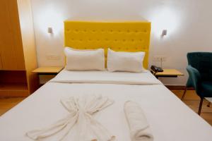 Postel nebo postele na pokoji v ubytování Jolly Panda Resort Goa + 37 fotografií