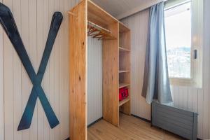 Postel nebo postele na pokoji v ubytování DIFY Grand Soleil - Courchevel 1650
