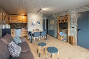 Kuchyň nebo kuchyňský kout v ubytování DIFY Grand Soleil - Courchevel 1650