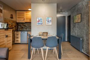 Kuchyň nebo kuchyňský kout v ubytování DIFY Grand Soleil - Courchevel 1650