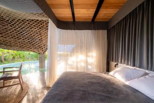 Postel nebo postele na pokoji v ubytování Bamboo Zanzibar