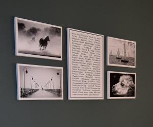 eine Gruppe von Bildern, die an einer Wand hängen in der Unterkunft Backhaus 3 in Staberdorf