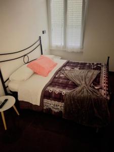 Postel nebo postele na pokoji v ubytování B&B Ladislaus