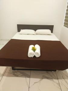 Letto o letti in una camera di Ayurnest Pool Resort Wayanad