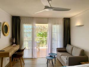 Posezení v ubytování Magnifique appartement avec terrasse Coco Beach