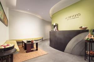 a lobby with a wine tasting room at Lynnaya Urban River Resort in Siem Reap