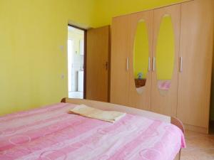 Postel nebo postele na pokoji v ubytování Apartment Nedo