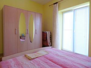 Postel nebo postele na pokoji v ubytování Apartment Nedo