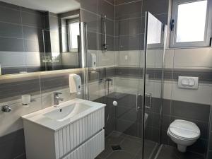 Koupelna v ubytování Garni Hotel Niš City View