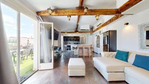 a living room with a couch and a table at Bluestay 201 - Superb apartment in Paris in Paris