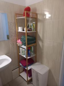Koupelna v ubytování Logement du soleil + 15 fotografií